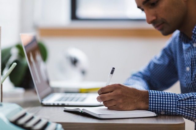 A man taking notes