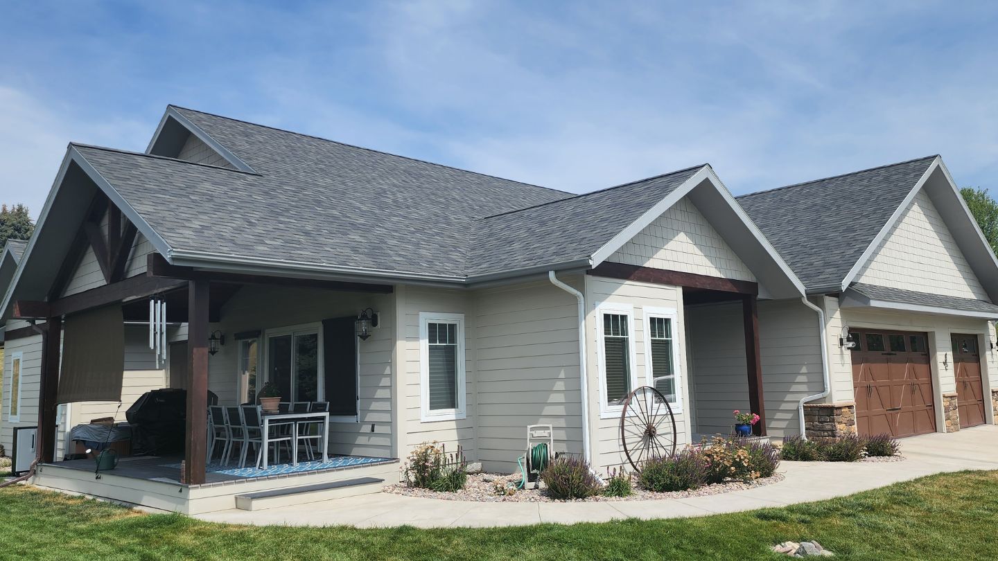 residential house with newly installed shingle roof